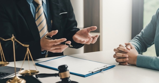 lawyer talking to a client