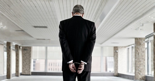 businessman in handcuffs