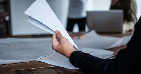 person reviewing documents