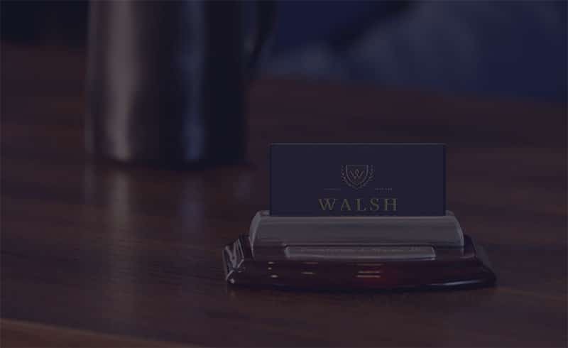 Walsh Law card and name plaque